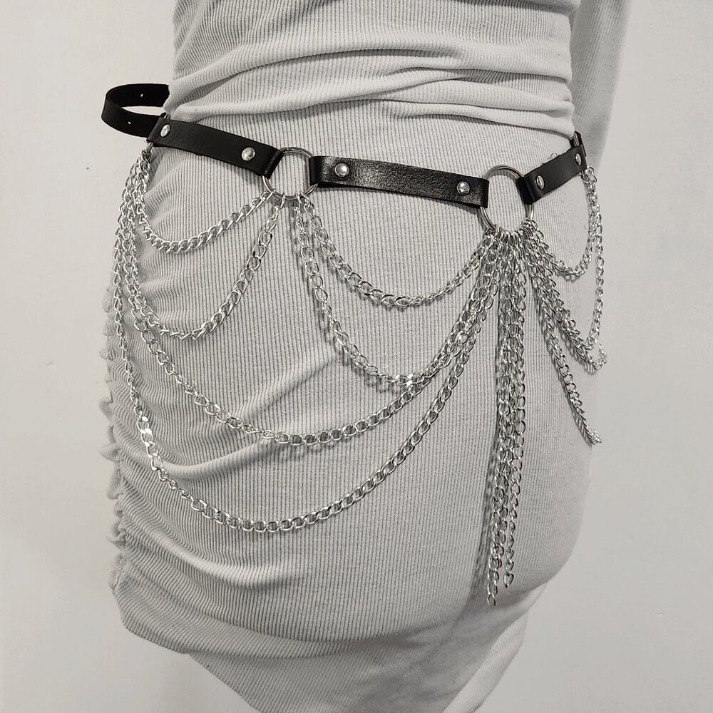 Belt with decorative chains. Fits waist or hips size 30" to 41"